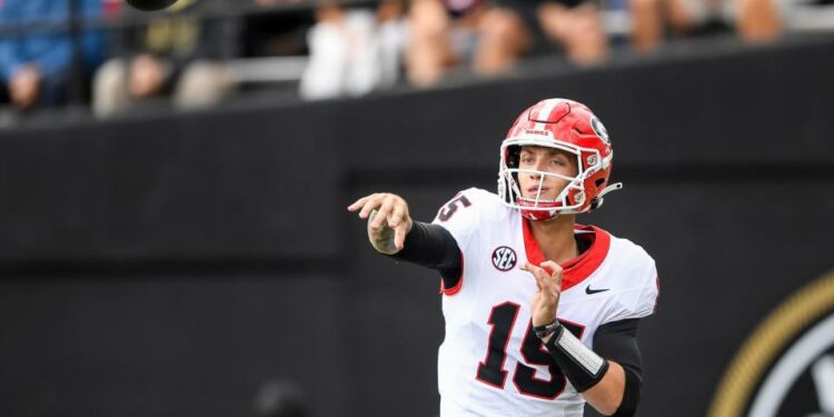 Oct 14, 2023; Nashville, Tennessee, USA; Georgia Bulldogs quarterback Carson Beck (15) throws a pass against the Vanderbilt Commodores during the second half at FirstBank Stadium. Mandatory Credit: Steve Roberts-USA TODAY Sports