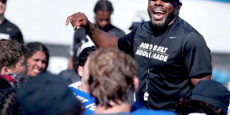 Middle Tennessee head coach Derek Mason speaks with his players at the end of Middle Tennessee’s Media Day football practice on Tuesday, Aug. 6, 2024.