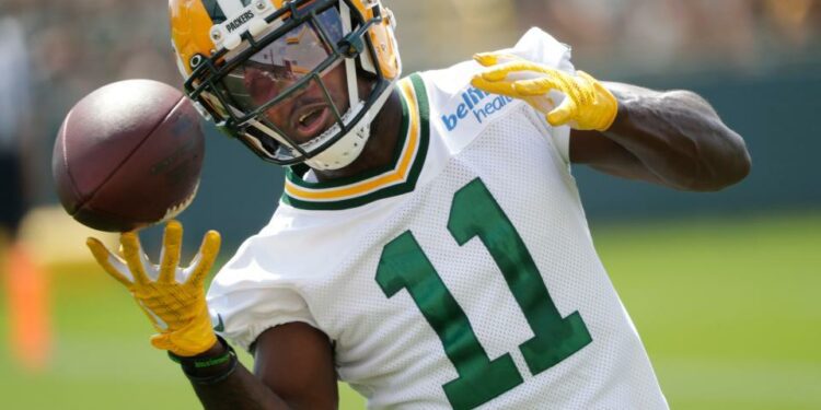 Jul 27, 2023; Green Bay, WI, USA; Green Bay Packers wide receiver Jayden Reed (11) makes a catch during training camp at Ray Nitschke Filed. Mandatory Credit: Daniel Powers-USA TODAY Sports ORG XMIT: IMAGN-713962 ORIG FILE ID: 20230727_gav_usa_186 .jpg