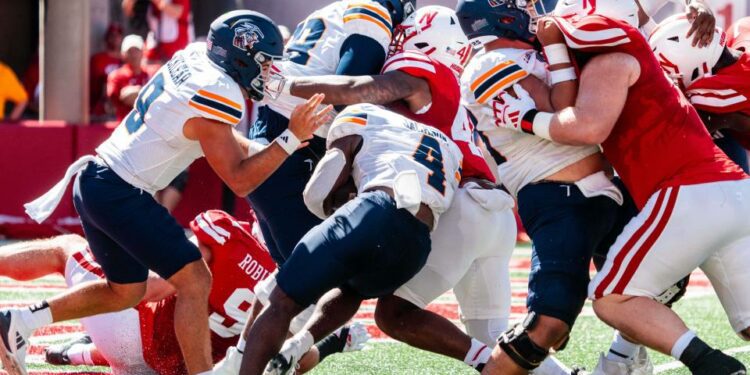 UTEP Miners running back Jevon Jackson (4) is tackled for a safety by the Nebraska Cornhuskers on Saturday during the second quarter at Memorial Stadium in Lincoln, Nebraska.