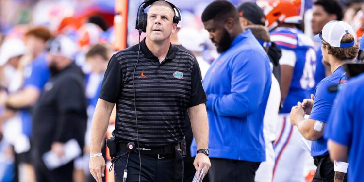 Florida Gators head coach Billy Napier walks on the sideline against the Miami Hurricanes during the second half at Ben Hill Griffin Stadium.