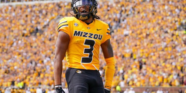 Sep 14, 2024; Columbia, Missouri, USA; Missouri Tigers wide receiver Luther Burden III (3) celebrates after scoring a touchdown against the Boston College Eagles during the first half at Faurot Field at Memorial Stadium. Mandatory Credit: Denny Medley-Imagn Images