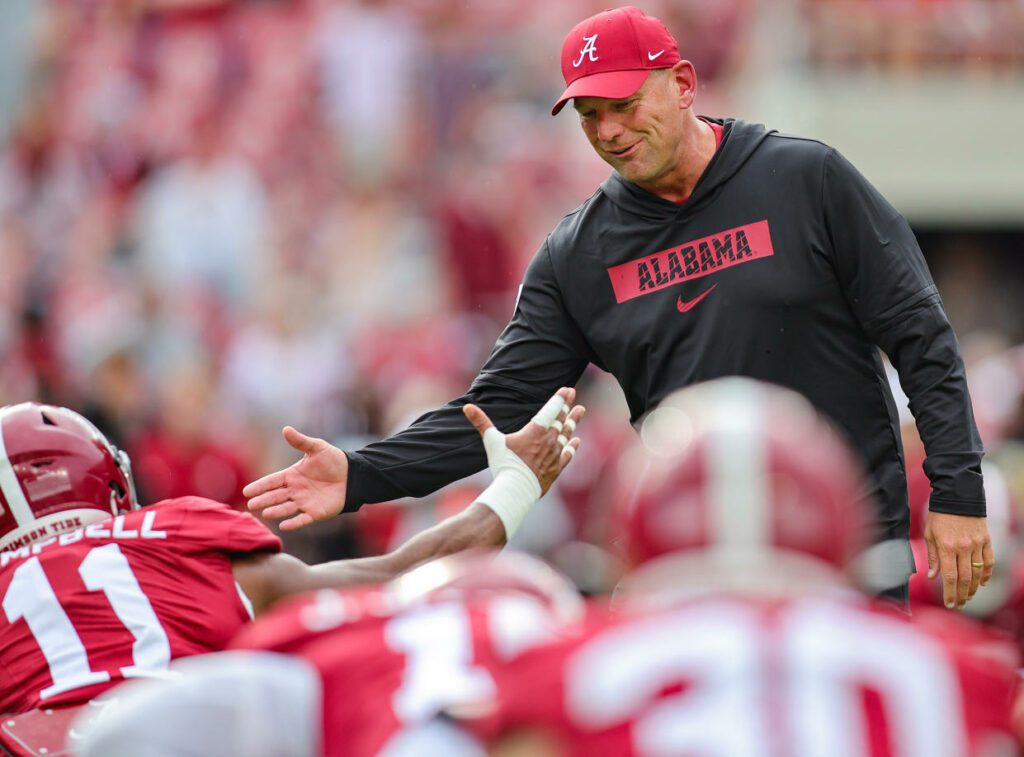 TUSCALOOSA, ALABAMA - AUGUST 31: Head coach Kalen DeBoer of the Alabama Crimson Tide encourages his  prior to kickoff against the Western Kentucky Hilltoppers at Bryant-Denny Stadium on August 31, 2024 in Tuscaloosa, Alabama. (Photo by Brandon Sumrall/Getty Images)