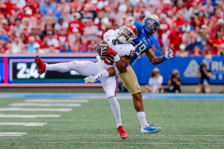 Sep 16, 2023; Tulsa, Oklahoma, USA; OklahomaÕs Kendel Dolby (15) intercepts the ball in the first quarter against the Tulsa Golden Hurricane at Skelly Field at H.A. Chapman Stadium. Mandatory Credit: Nathan J. Fish-USA TODAY Sports