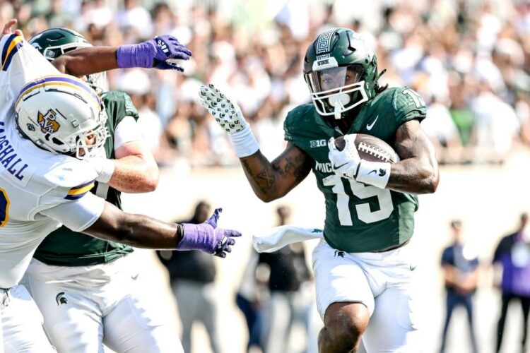 Michigan State's Kay'ron Lynch-Adams runs for a gain against Prairie View A&M during the first quarter on Saturday, Sept. 14, 2024, at Spartan Stadium in East Lansing.