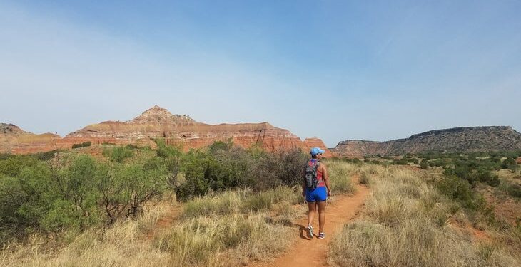 woman hiking at Palo Duro Canyon State Park