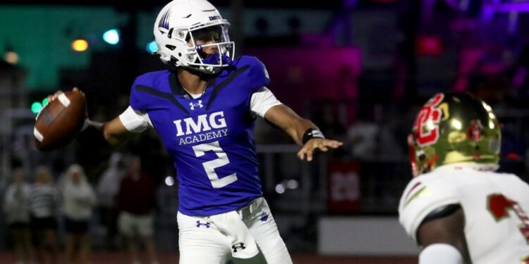 IMG Academy's Ty Hawkins (2) passes the ball during the third quarter of the Battle at the Beach football game against Bergen Catholic at Carey Stadium in Ocean City, N.J., Thursday, Aug. 29, 2024.