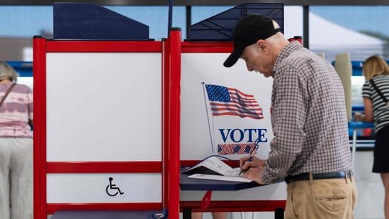 MINNEAPOLIS, MINNESOTA - SEPTEMBER 20: Voters fill out their ballots at the Minneapolis Elections & Voter Services building on September 20, 2024 in Minneapolis, Minnesota. Today is the first day of early voting in Minnesota ahead of the 2024 presidential election this November. Stephen Maturen/Getty Images/AFP (Photo by Stephen Maturen / GETTY IMAGES NORTH AMERICA / Getty Images via AFP)(Getty Images via AFP)