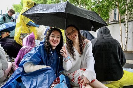 Sisters Sinéad and Eimear Desmond Flynn from Wexford set up camp at the gates of the Aviva Stadium at 8am in the rain to be among the first people to get into the venue for Taylor Swift’s second Dublin performance. Picture: Chani Anderson