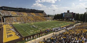 University of Wyoming Football Team Kicks Off Season in Illinois