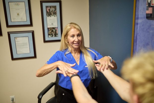 Dr. Gloria Beim examines Jacob Riser at the Gunnison Valley Orthopedics and Sports Medicine Clinic in Gunnison, CO on Thursday, June 27, 2024. (Photo by Jacob Spetzler/Special to The Denver Post)