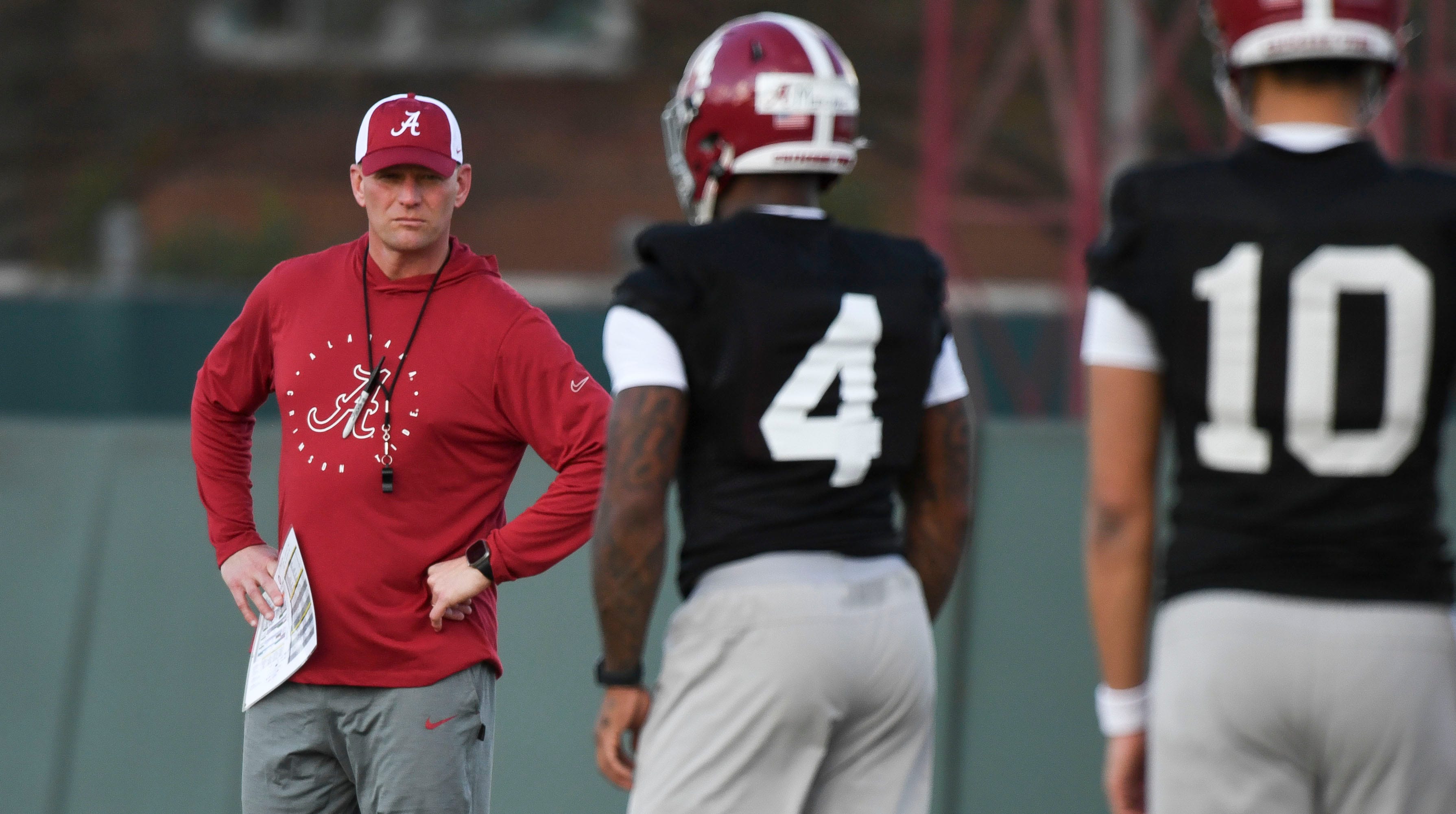 Mar 6, 2024; Tuscaloosa, Alabama, USA; Alabama head coach Kalen DeBoer watches his quarterbacks go through drills during practice of the Alabama Crimson Tide football team Wednesday.