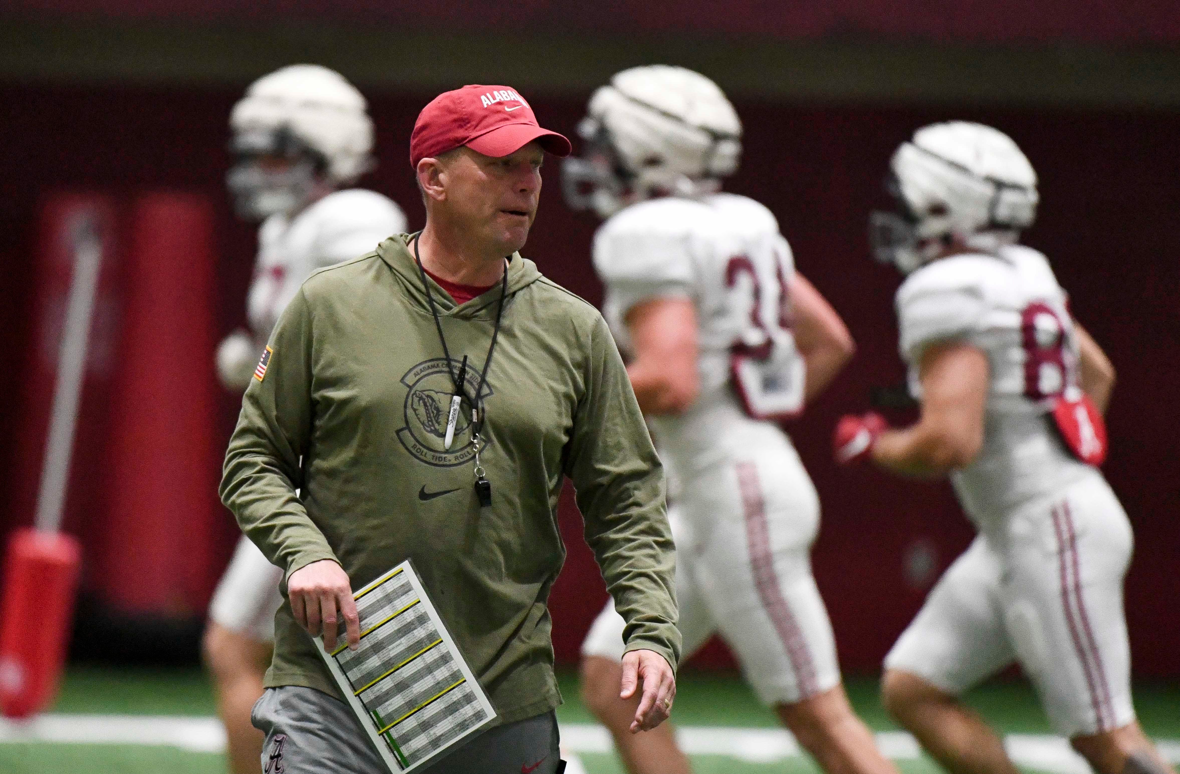 April 9, 2024; Tuscaloosa, Alabama, USA; Alabama head coach Kalen DeBoer coaches his team during practice in the Hank Crisp Indoor Practice Facility at the University of Alabama. Gary Cosby Jr.-Tuscaloosa News