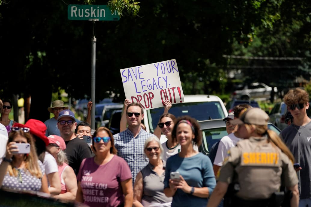 People gather outside U.S. President Joe Biden's campaign event at Sherman Middle School, in Madison, Wisconsin, U.S., July 5, 2024.