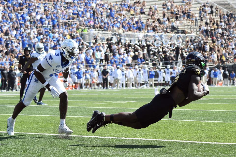 Sep 23, 2023; Nashville, Tennessee, USA; Vanderbilt Commodores wide receiver Quincy Skinner Jr. (3) dives to catch a pass on a two-point conversion against the Kentucky Wildcats during the second half at FirstBank Stadium. Mandatory Credit: Christopher Hanewinckel-USA TODAY Sports