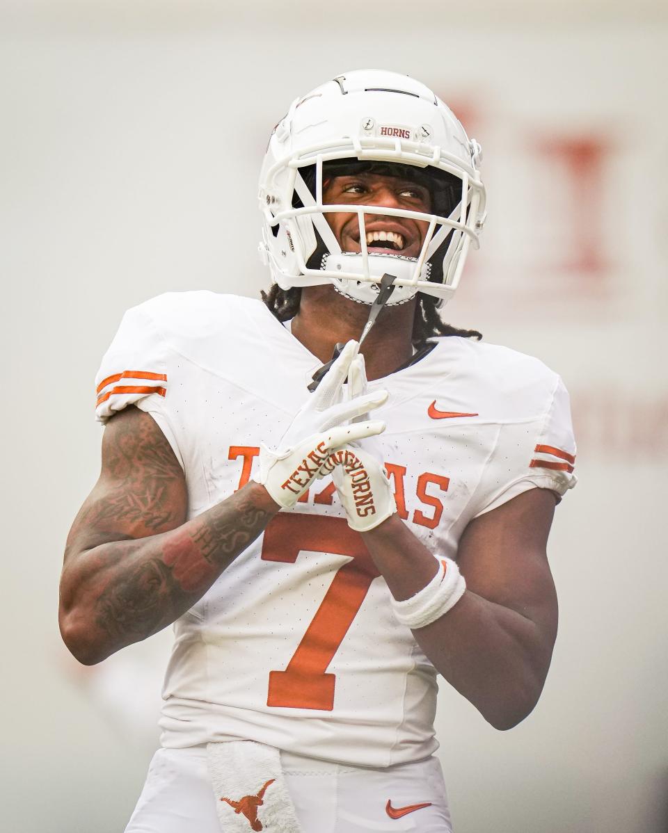 Texas White team wide receiver Isaiah Bond (7) celebrates scoring a touchdown in the fourth quarter of the Longhorns' spring Orange and White game at Darrell K Royal Texas Memorial Stadium in Austin, Texas, April 20, 2024.