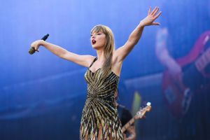 Taylor Swift performs onstage during the Eras Tour on July 13 in Milan, Roberto Cavalli, fringe minidress, Fausto Puglisi, ray of gold