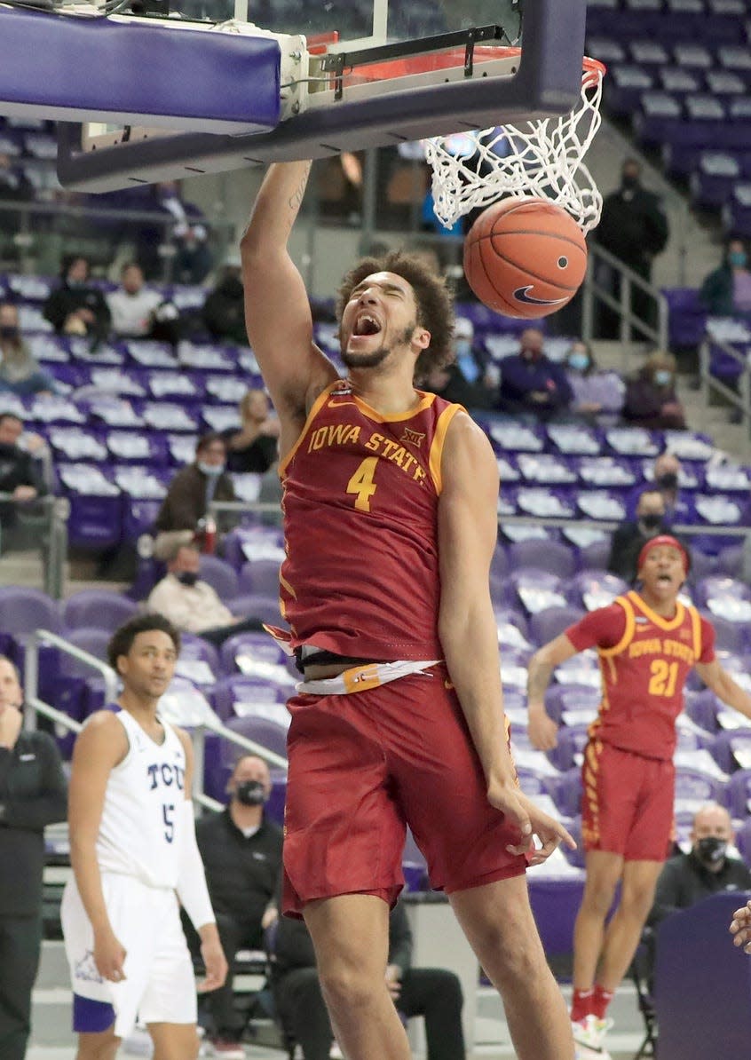 Feb 9, 2021; Fort Worth, Texas, USA;  Iowa State Cyclones forward George Conditt IV (4) dunks during the second half against the TCU Horned Frogs at  Ed and Rae Schollmaier Arena. Mandatory Credit: Kevin Jairaj-USA TODAY Sports