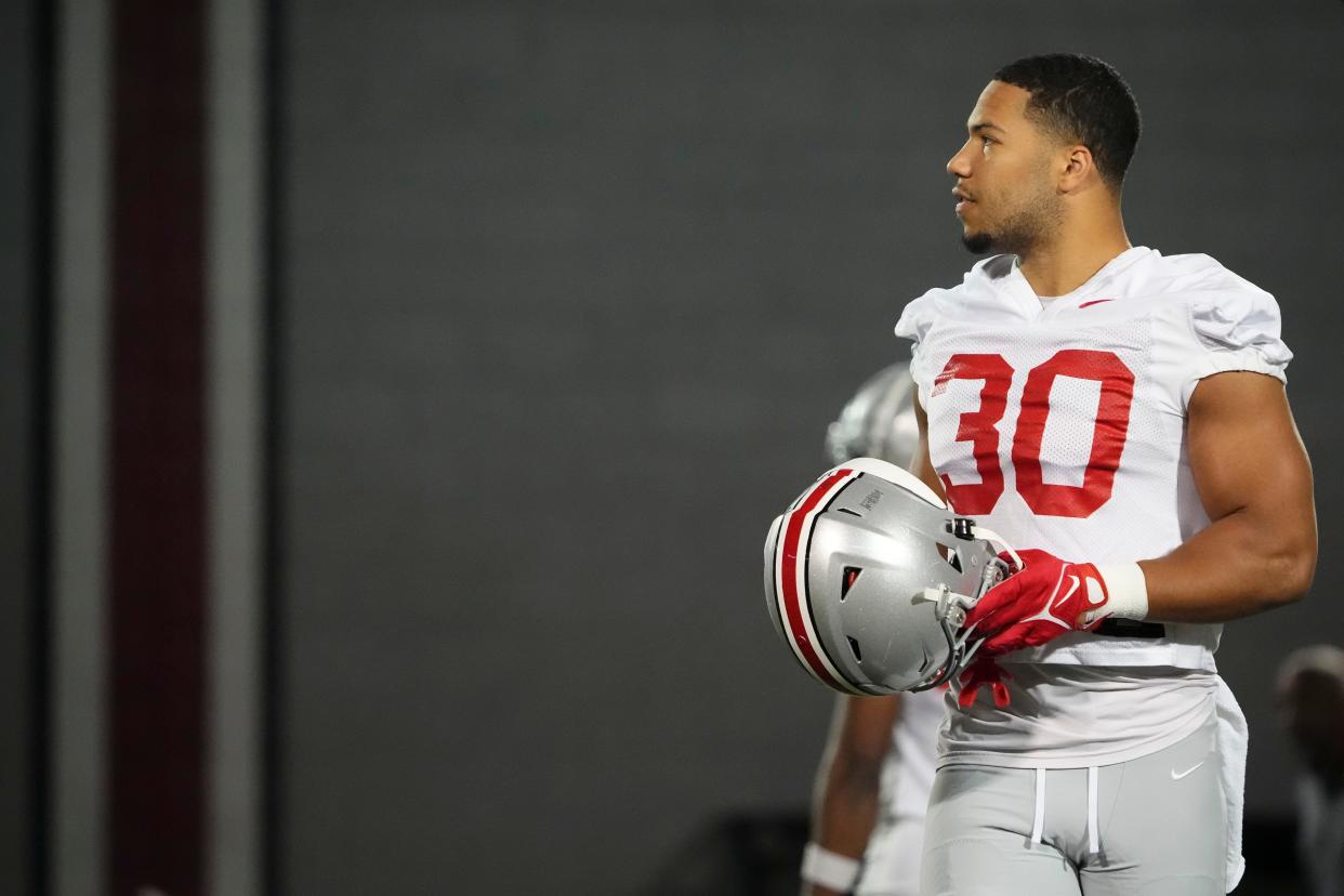 Mar 7, 2024; Columbus, OH, USA; Ohio State Buckeyes linebacker Cody Simon (30) warms up during spring football practice at the Woody Hayes Athletic Center.