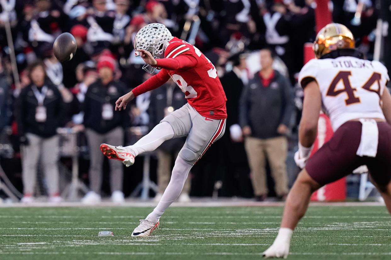 Nov 18, 2023; Columbus, Ohio, USA; Ohio State Buckeyes place kicker Jayden Fielding (38) kicks off during the NCAA football game against the Minnesota Golden Gophers at Ohio Stadium.