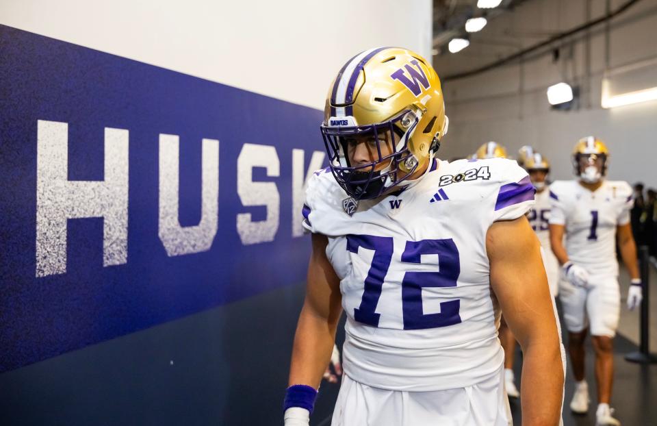 Jan 8, 2024; Houston, TX, USA; Washington Huskies offensive lineman Parker Brailsford (72) against the Michigan Wolverines during the 2024 College Football Playoff national championship game at NRG Stadium. Mandatory Credit: Mark J. Rebilas-USA TODAY Sports