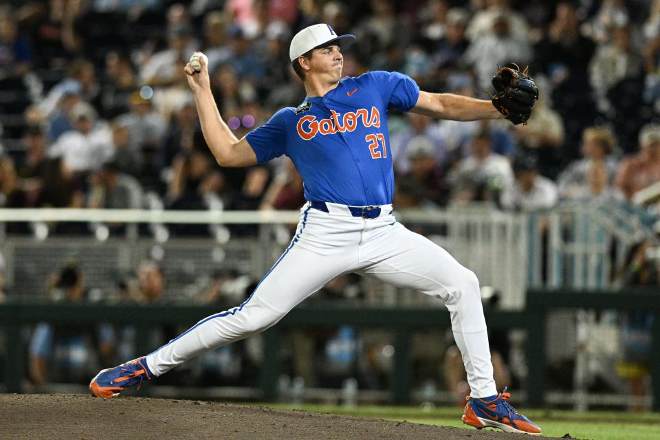 Jun 15, 2024; Omaha, NE, USA; Florida Gators pitcher Fisher Jameson (27) throws against the Texas A&M Aggies at Charles Schwab Field Omaha. Mandatory Credit: Steven Branscombe-USA TODAY Sports