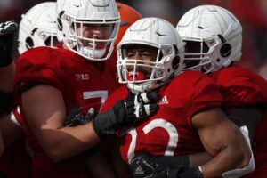 Nebraska Cornhuskers running back Devine Ozigbo (22) celebrates with teammates after scoring a touchdown in the second half against the Illinois Fighting Illini at Memorial Stadium. Nebraska won 54-35. 