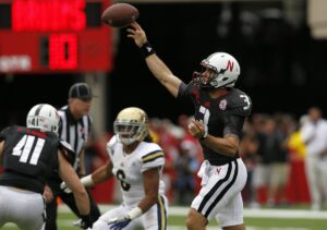 Nebraska Cornhuskers quarterback Taylor Martinez (3) passes against the UCLA Bruins in the third quarter at Memorial Stadium.