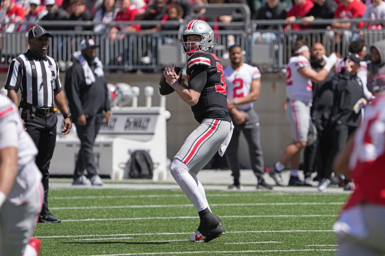 Apr 13, 2024; Columbus, OH, USA; Ohio State Buckeyes quarterback Devin Brown (33) looks to pass the ball during the Ohio State football spring game at Ohio Stadium.