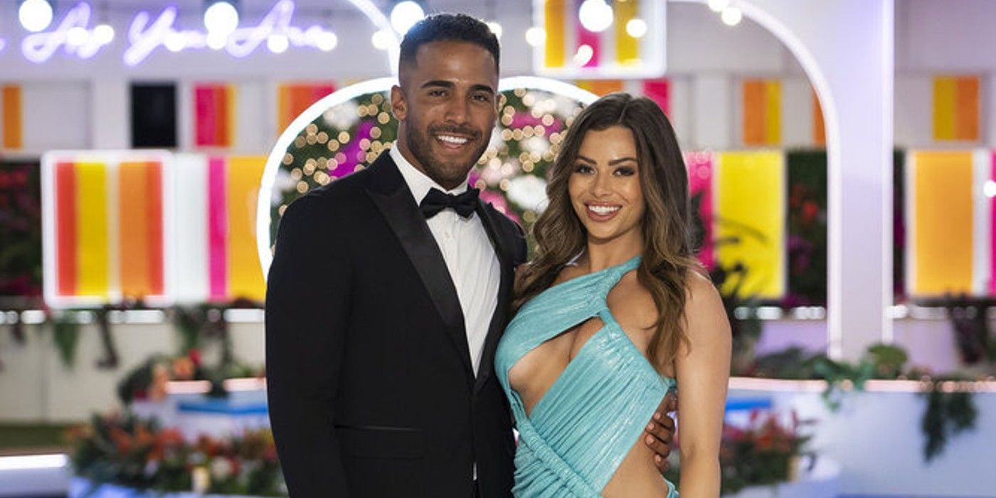 Kendall Washington and Nicole Jacky from Love Island USA season 6 posing in formal wear in front of the villa.