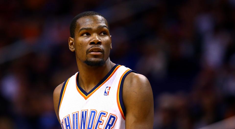 March 6, 2014; Phoenix, AZ, USA; Oklahoma City Thunder forward Kevin Durant (35) against the Phoenix Suns at the US Airways Center. Mark J. Rebilas-USA TODAY Sports