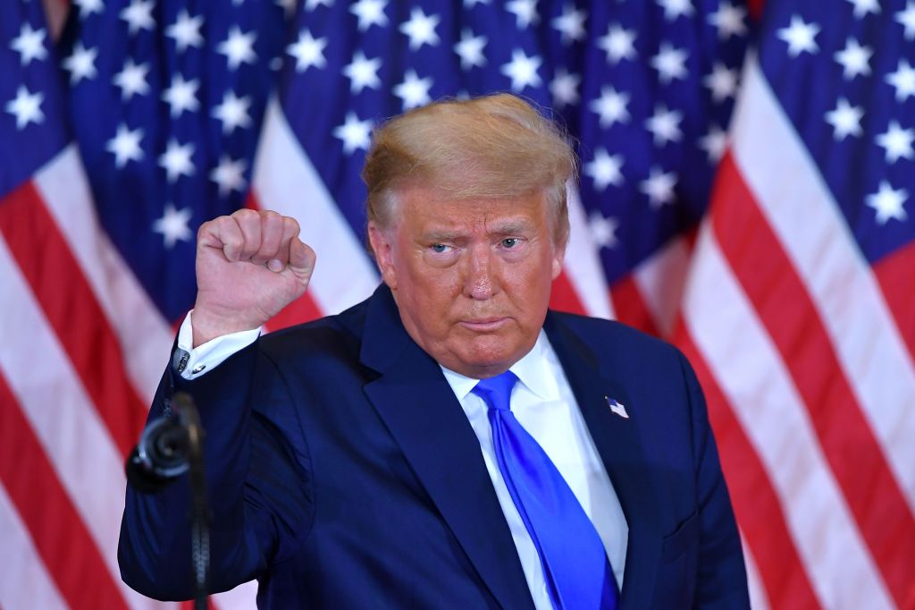 Trump pumps his fist after speaking during election night in the East Room of the White House in Washington, DC, early on November 4, 2020. 