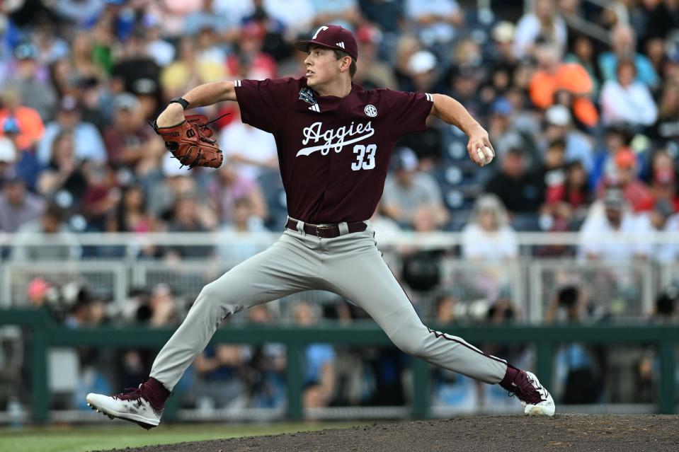 Jun 19, 2024; Omaha, NE, USA; Texas A&M Aggies starting pitcher Justin Lamkin (33) throws against the Florida Gators during the first inning at Charles Schwab Field Omaha. Mandatory Credit: Steven Branscombe-USA TODAY Sports