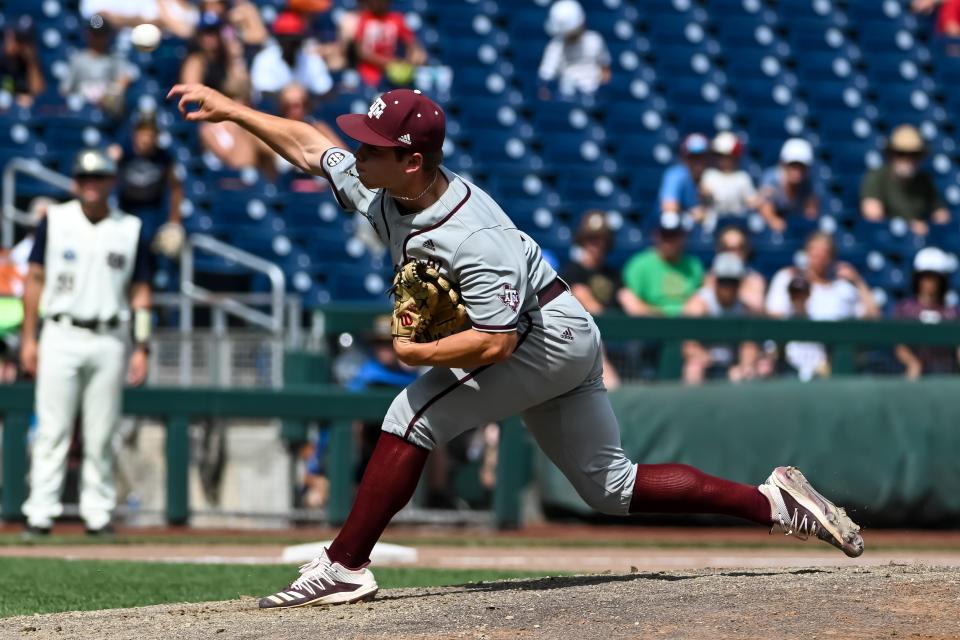 Jun 21, 2022; Omaha, NE, USA; Texas A&M Aggies pitcher Brad Rudis (32) throws against the Notre Dame Fighting Irish in the eighth inning at Charles Schwab Field. Mandatory Credit: Steven Branscombe-USA TODAY Sports