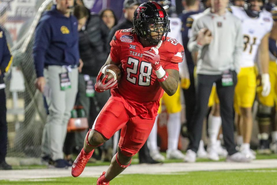 Texas Tech running back Tahj Brooks (28) rushing the football during the 47th Radience Technology Independence Bowl Saturday evening, December 16, 2023, in Shreveport, La.