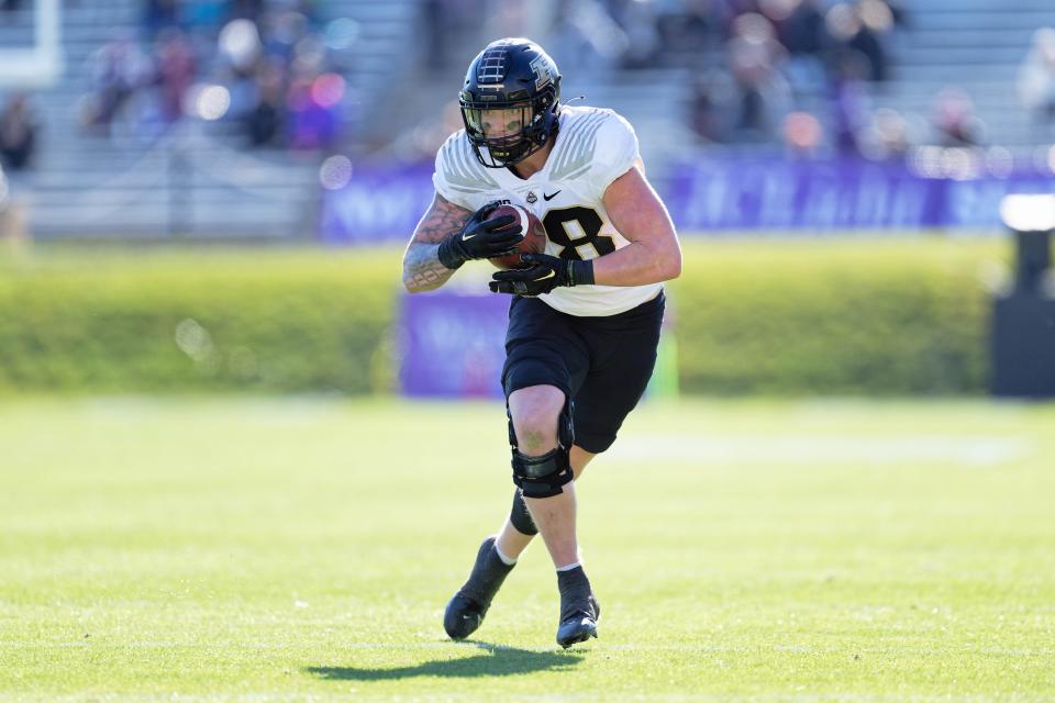 Nov 18, 2023; Evanston, Illinois, USA; Purdue Boilermakers tight end Garrett Miller (88) runs with the ball against the Northwestern Wildcats at Ryan Field. Mandatory Credit: Jamie Sabau-USA TODAY Sports