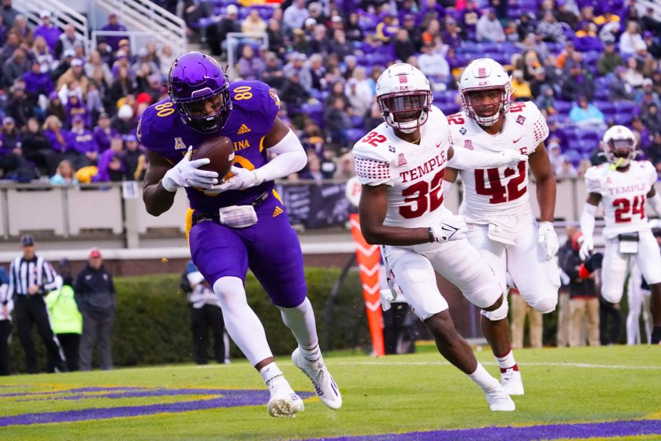 Nov 6, 2021; Greenville, North Carolina, USA; East Carolina Pirates tight end Shane Calhoun (80) makes a first half touchdown catch behind Temple Owls safety John Mitchem (32) at Dowdy-Ficklen Stadium. Mandatory Credit: James Guillory-USA TODAY Sports