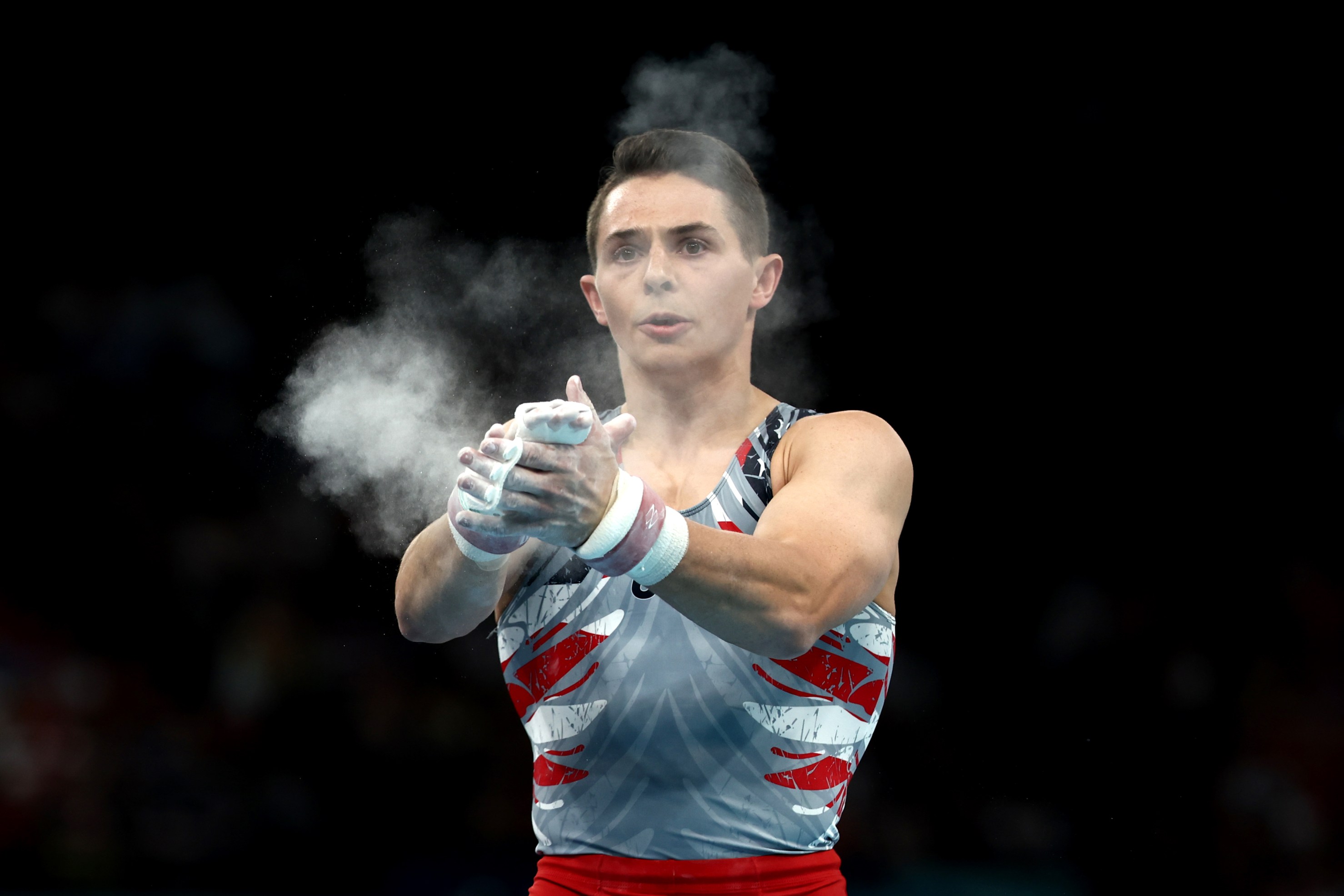 Paul Juda of Team United States celebrates his routine on the high bar during the Artistic Gymnastics Men's Team Final on day three of the Olympic Games Paris 2024 at Bercy Arena on July 29, 2024 in Paris, France. (Photo by Naomi Baker/Getty Images)