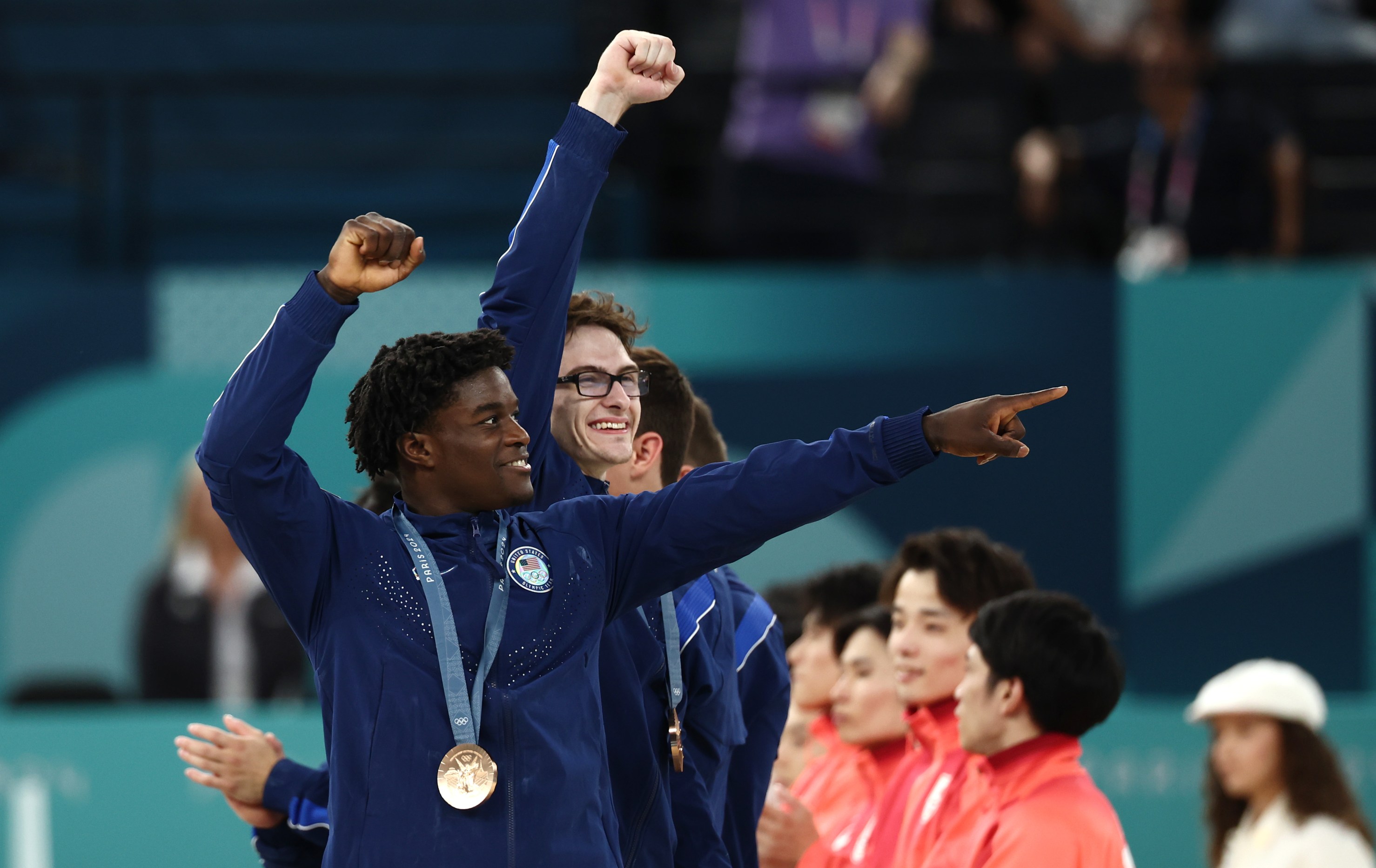 Frederick Richard and Stephen Nedoroscik of Team United States celebrate during the medal ceremony for the Artistic Gymnastics Men's Team Final on day three of the Olympic Games Paris 2024 at Bercy Arena on July 29, 2024 in Paris, France. (Photo by Naomi Baker/Getty Images)