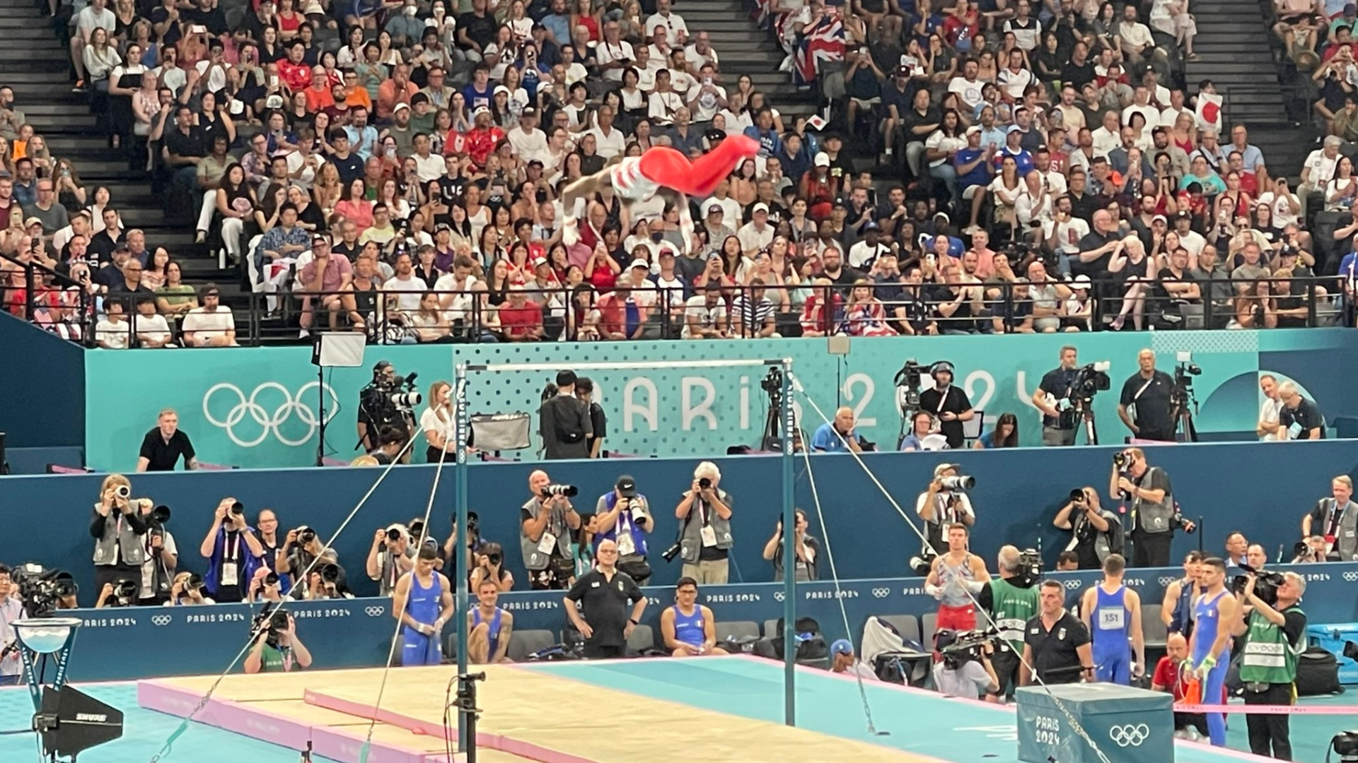 The USA's Fred Richard on the high bar during the men's team gymnastics competition in Paris on July 29, 2024.