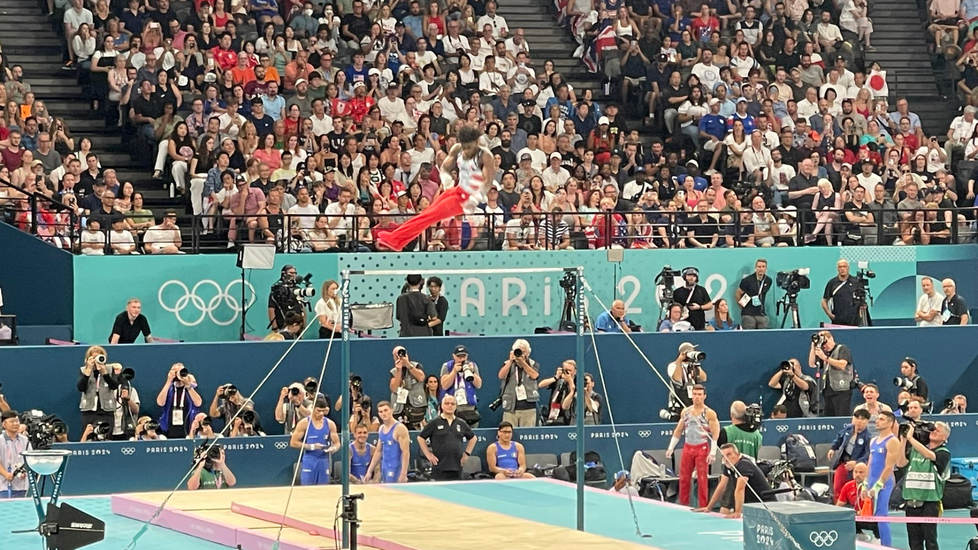 The USA's Fred Richard on the high bar during the men's team gymnastics competition in Paris on July 29, 2024.