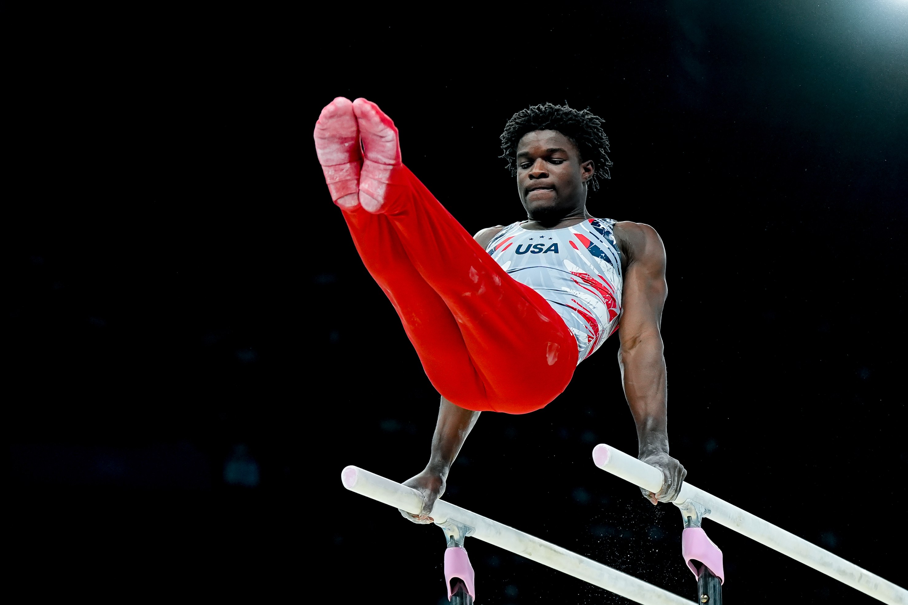 Frederick Richard of United States on Parallel Bars during the Men's Artistic Gymnastics Team Final on day three of the Olympic Games Paris 2024 at Bercy Arena on July 29, 2024 in Paris, France. (Photo by Daniela Porcelli/Eurasia Sport Images/Getty Images)