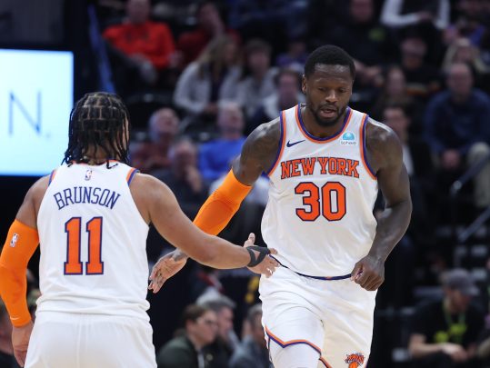 New York Knicks forward Julius Randle (30) and guard Jalen Brunson (11) react to a play against the Utah Jazz during the third quarter at Delta Center