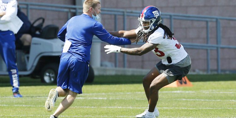 May 14, 2021; East Rutherford, New Jersey, USA; New York Giants cornerback Aaron Robinson (33) works out during rookie minicamp at Quest Diagnostics Training Center. Mandatory Credit: Andy Marlin-USA TODAY Sports