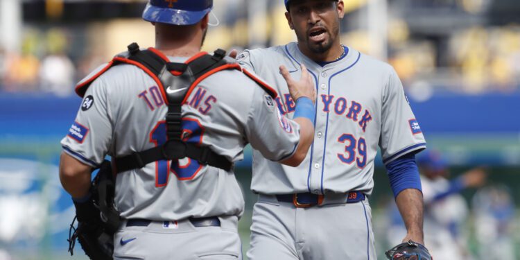 Jul 7, 2024; Pittsburgh, Pennsylvania, USA;  New York Mets catcher Luis Torrens (13) and relief pitcher Edwin Diaz (39) celebrate after defeating the Pittsburgh Pirates during the ninth inning at PNC Park. The Mets won 3-2. Mandatory Credit: Charles LeClaire-USA TODAY Sports