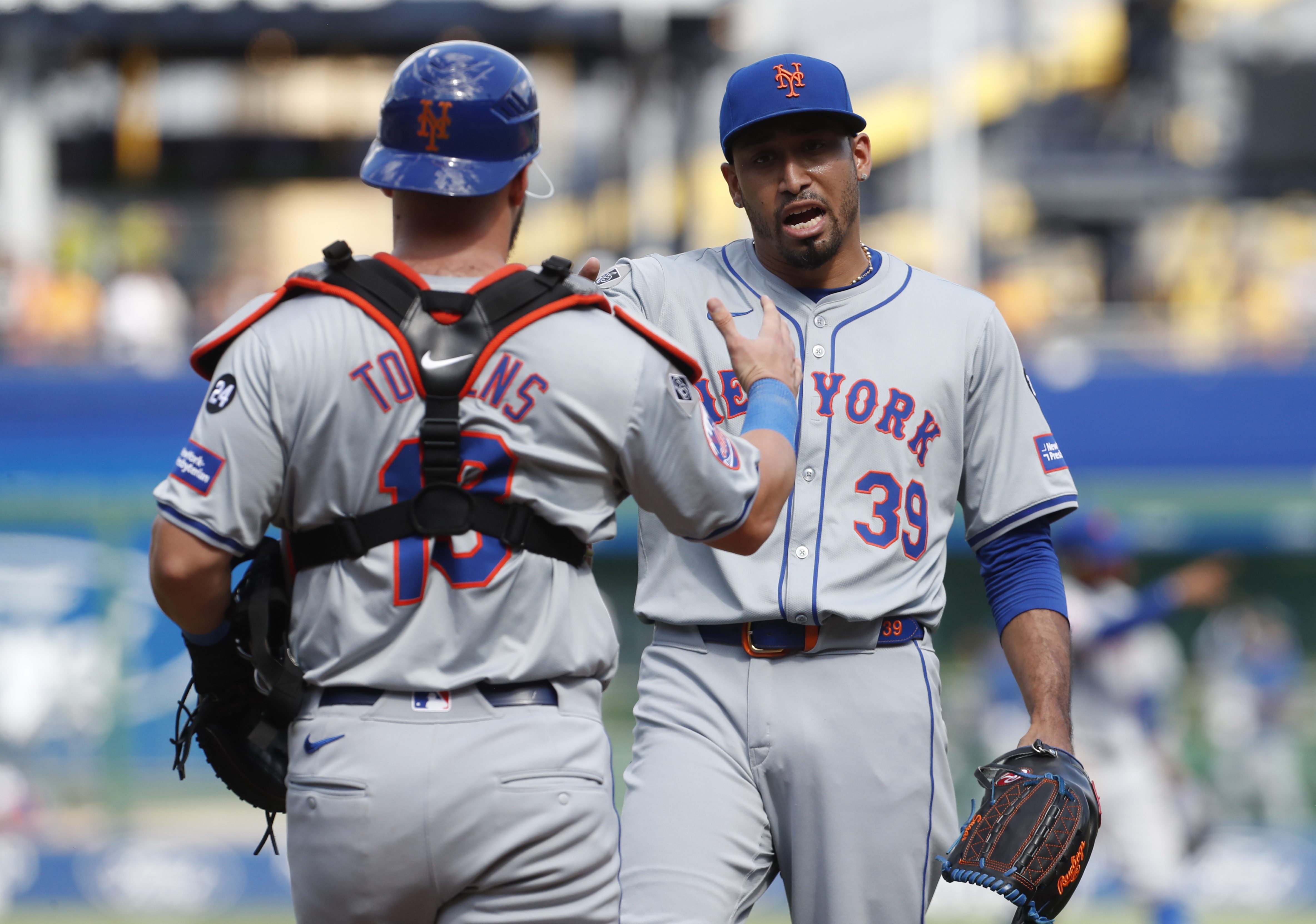 Jul 7, 2024; Pittsburgh, Pennsylvania, USA;  New York Mets catcher Luis Torrens (13) and relief pitcher Edwin Diaz (39) celebrate after defeating the Pittsburgh Pirates during the ninth inning at PNC Park. The Mets won 3-2. Mandatory Credit: Charles LeClaire-USA TODAY Sports