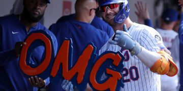 Jul 28, 2024; New York City, New York, USA; New York Mets first baseman Pete Alonso (20) celebrates his two run home run against the Atlanta Braves in the dugout during the eighth inning at Citi Field. Mandatory Credit: Brad Penner-USA TODAY Sports