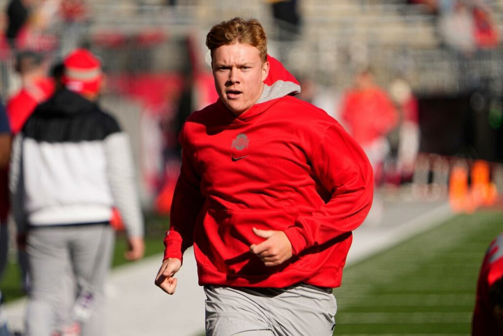 Nov 26, 2022; Columbus, Ohio, USA; Ohio State Buckeyes quarterback Devin Brown (15) warms up prior to the NCAA football game against the Michigan Wolverines at Ohio Stadium. Mandatory Credit: Adam Cairns-The Columbus Dispatch