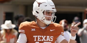 Arch Manning in a Texas helmet