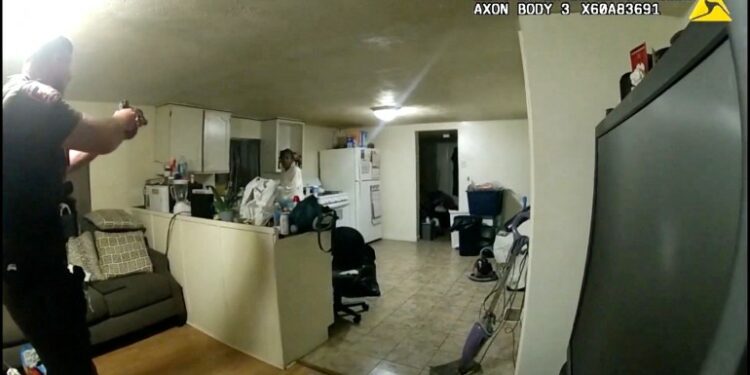 Sangamon County Sheriff's Deputy Sean Grayson points his weapon at Sonya Massey before shooting her, during a call for help at her home July 6 captured on a still photograph from body camera video released by the Illinois State Police July 22, 2024. Illinois State Police/Handout via REUTERS. THIS IMAGE HAS BEEN SUPPLIED BY A THIRD PARTY